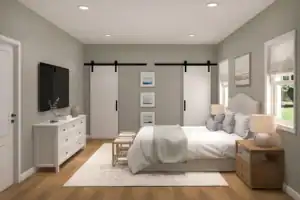 ADU bedroom featuring luxury vinyl flooring, neutral palette, farm doors, and modern lighting