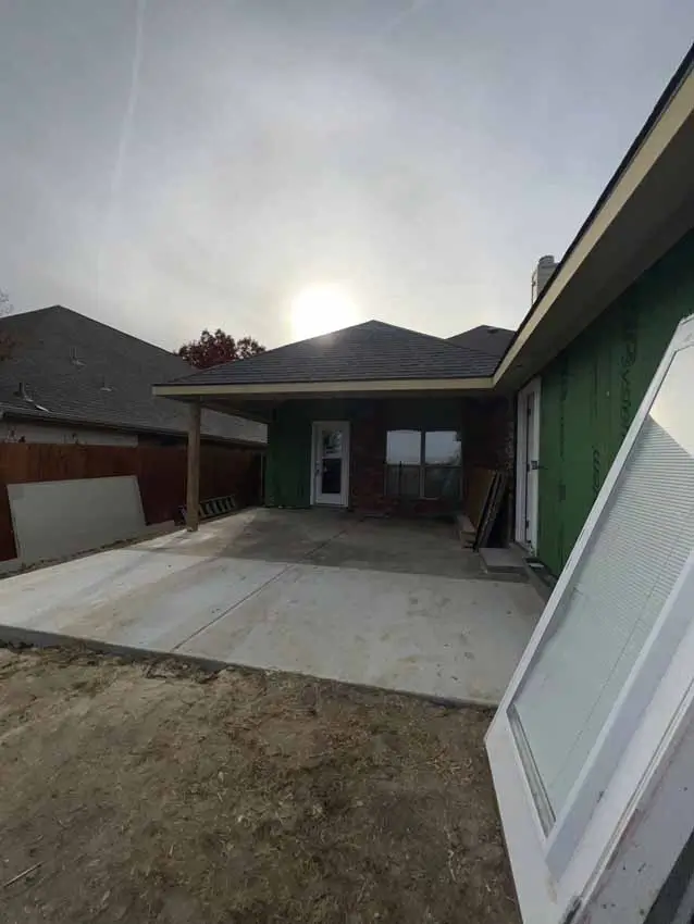 Completed Concrete Patio And Rear Exterior Of A Remodeled 025