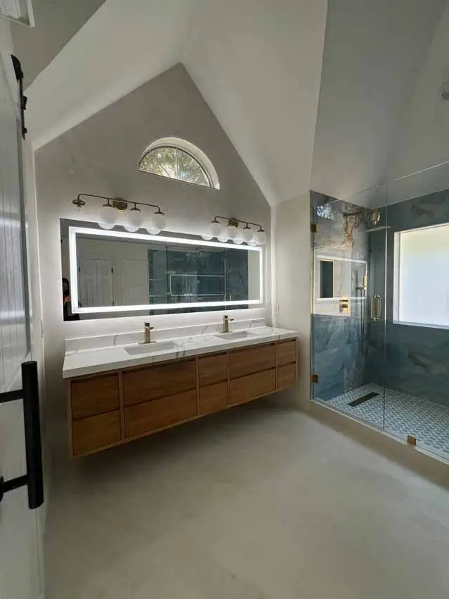 Remodeled Primary Bathroom With Floating Wood Vanity Freestanding Tub And 007 1